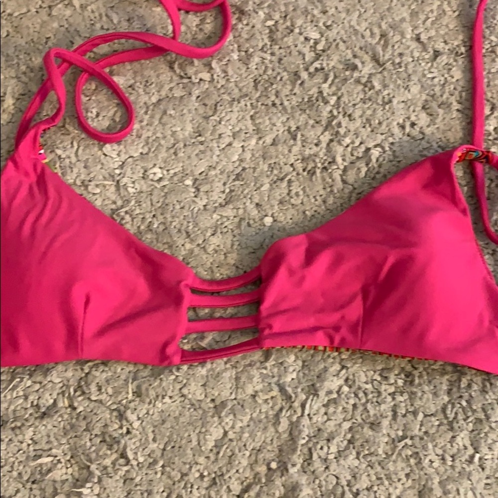 Reversible swim top